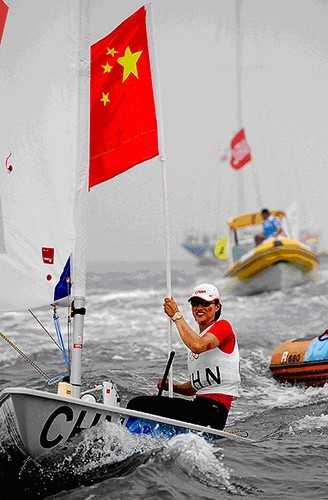 20-year-old Chinese athlete, Xu Lijia, scored her country’s first medal in sailing. © MIAA
